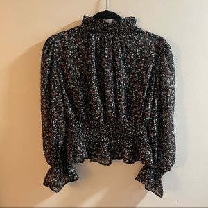 Semi-sheer black floral mockneck top